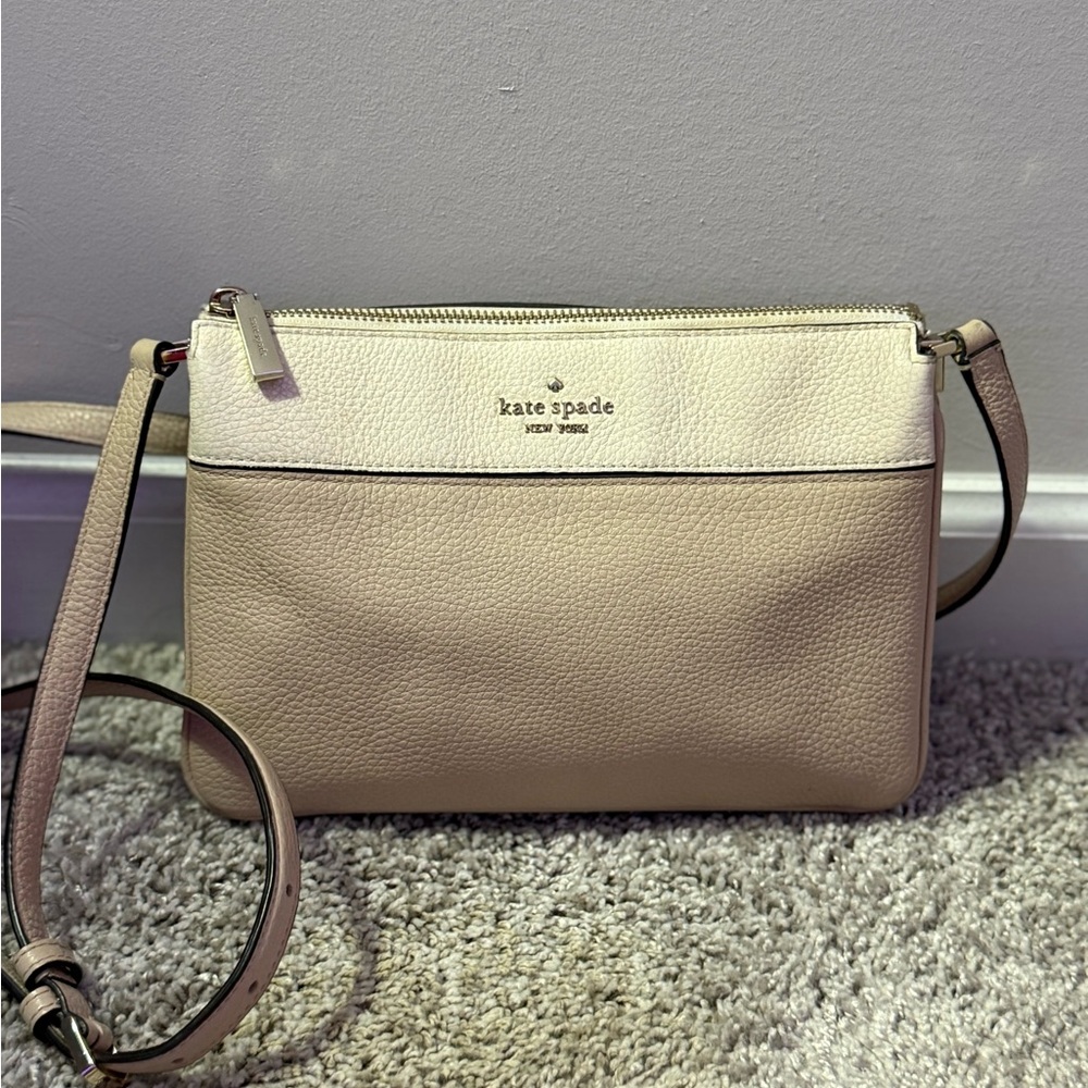 Kate Spade Cream Crossbody Bag with Modern Design